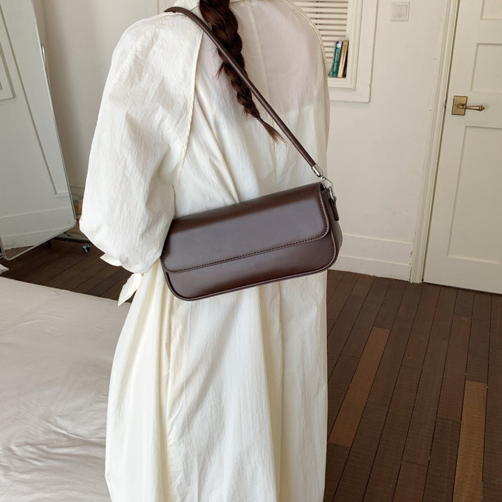 Damen elegante Handtasche mit dekorativem Anhänger Nord Taschen