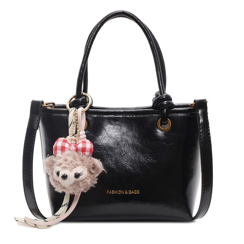Damen Modische Handtasche mit verspieltem Tieranhänger Nord Taschen