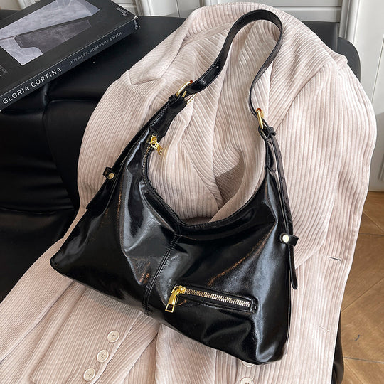 Damen Hobo-Tasche mit glänzender Oberfläche und praktischen Reißverschlusstaschen Nord Taschen