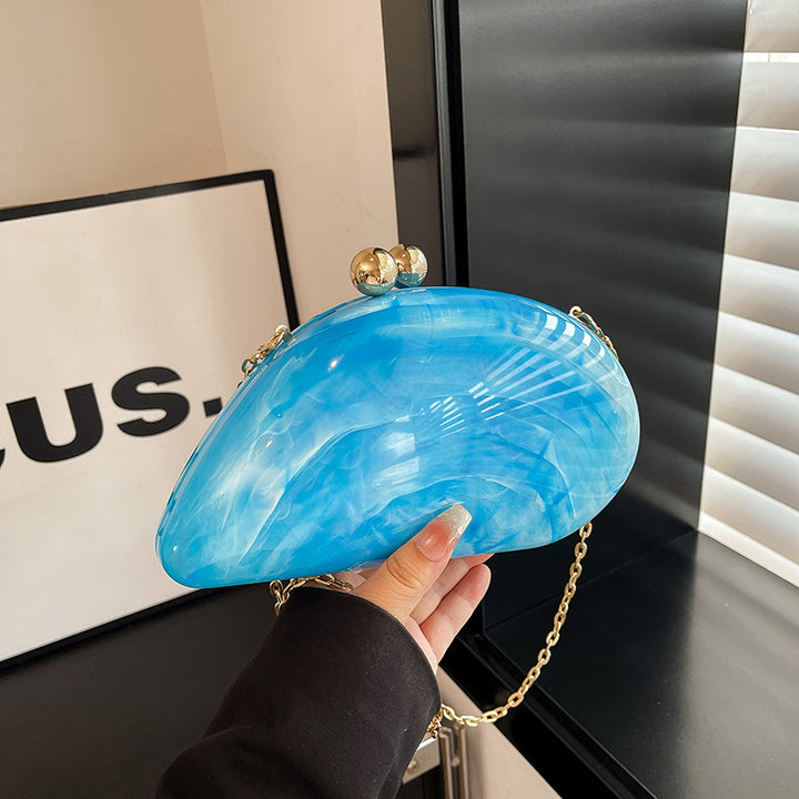 Damen Clutch im eleganten Muscheldesign Nord Taschen