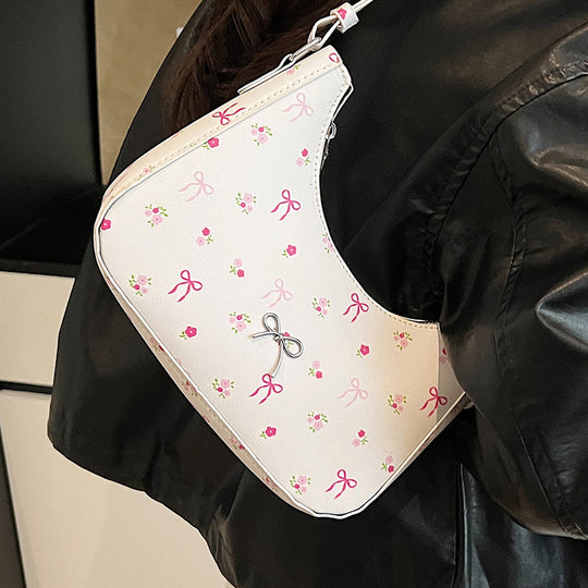 Damen Umhängetasche mit floralen Applikationen und verspieltem Schleifenverschluss Nord Taschen