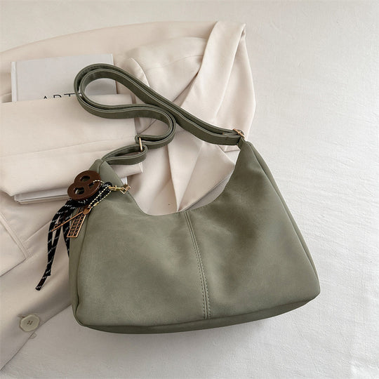 Damen Schultertasche mit modischem Anhänger Nord Taschen