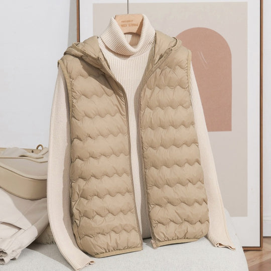 Damen Ultraleichte Kapuzen-Steppweste mit ergonomischer Wellensteppung und kompaktem Packformat Nord Taschen