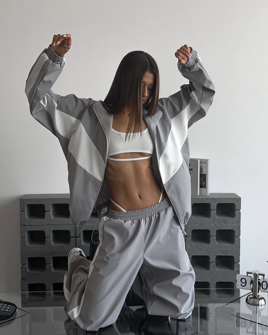Damen sportives Zweiteiler-Set aus Oversize-Trackjacke mit Reißverschluss und weitem Bundfalten-Hose Nord Taschen