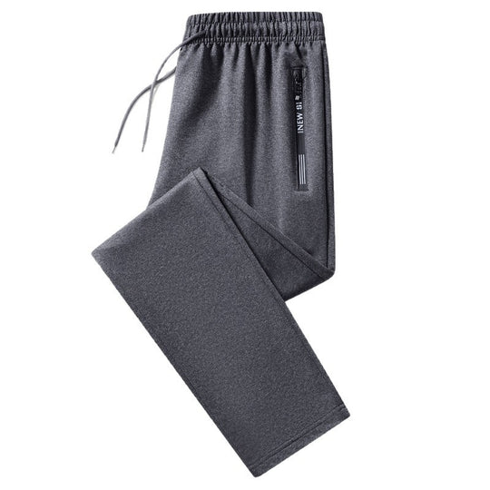 Herren Sportliche Trainingshose mit elastischem Tunnelzugbund, Reißverschlusstasche und glattem Performance‑Material Nord Taschen