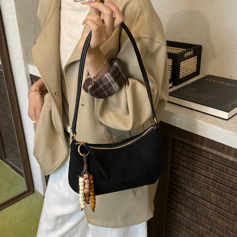 Damen Schultertasche aus weichem Veloursleder mit eleganter Form Nord Taschen