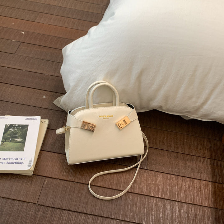 Damen elegante Handtasche mit verspieltem Verschluss Nord Taschen