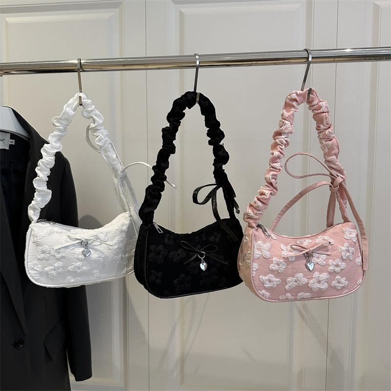 Damen modische Umhängetasche mit floralem Design und raffiniertem Tragegriff Nord Taschen