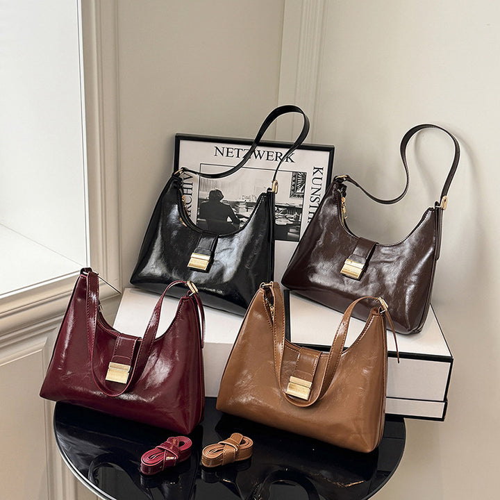 Damen Umhängetasche aus hochwertigem Kunstleder mit elegantem Klappverschluss Nord Taschen