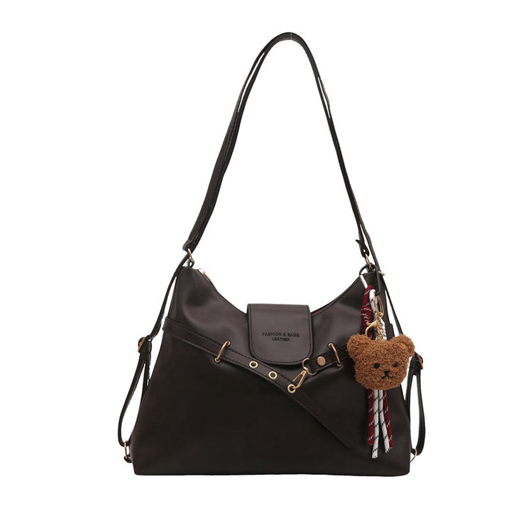 Damen modische Umhängetasche mit verspieltem Anhänger und edlem Design Nord Taschen