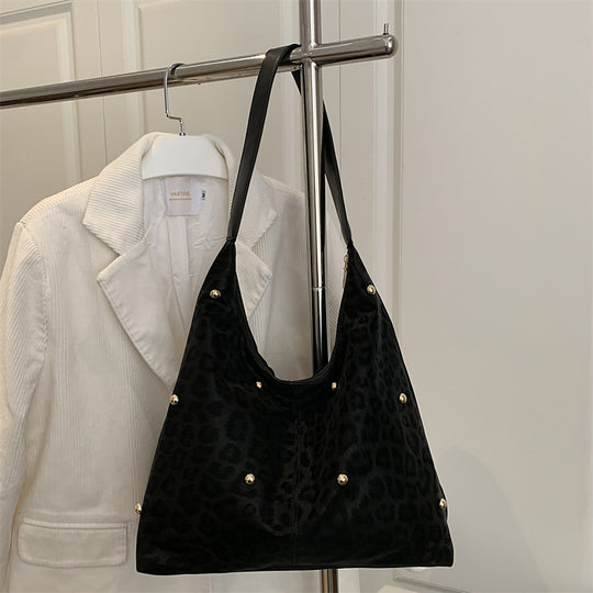 Damen Hobo-Tasche mit elegantem Leopardenmuster und goldenen Akzenten Nord Taschen