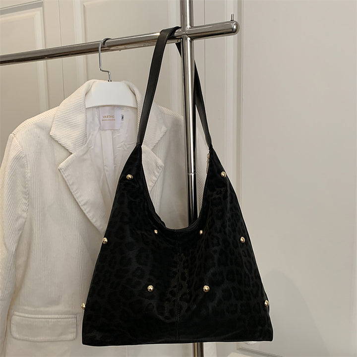 Damen Hobo-Tasche mit elegantem Leopardenmuster und goldenen Akzenten Nord Taschen