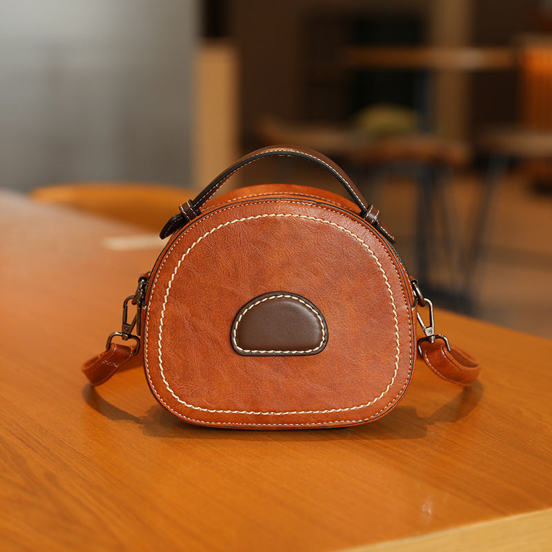 Damen Designer Umhängetasche mit innovativem runden Schnitt Nord Taschen