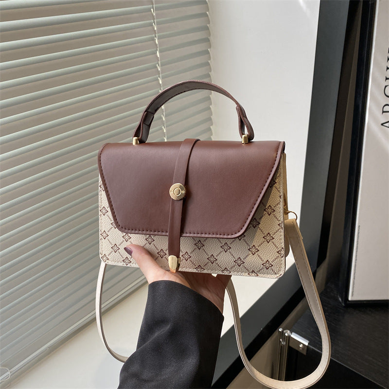 Damen Umhängetasche mit modernem Klappenverschluss und praktischem Handgriff Nord Taschen