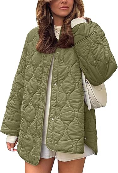 Damen Steppjacke im Oversize Design mit gewölbter Steppung und seitlichem Schlitz Nord Taschen
