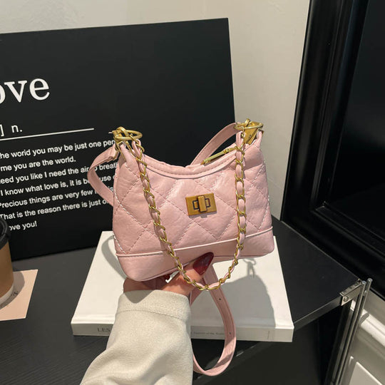 Damen stilvolle Umhängetasche aus glänzendem Kunstleder mit eleganter Kettenakzent Nord Taschen