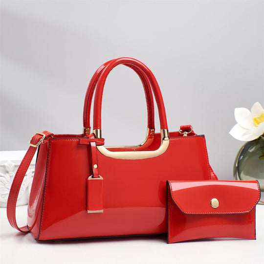 Damen Handtasche mit glänzender Oberfläche und elegantem Kettenakzent Nord Taschen
