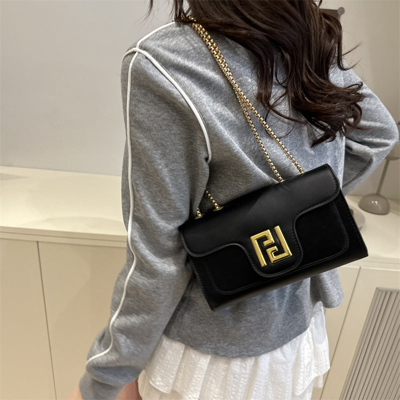 Damen elegante Umhängetasche mit goldenen Akzenten Nord Taschen