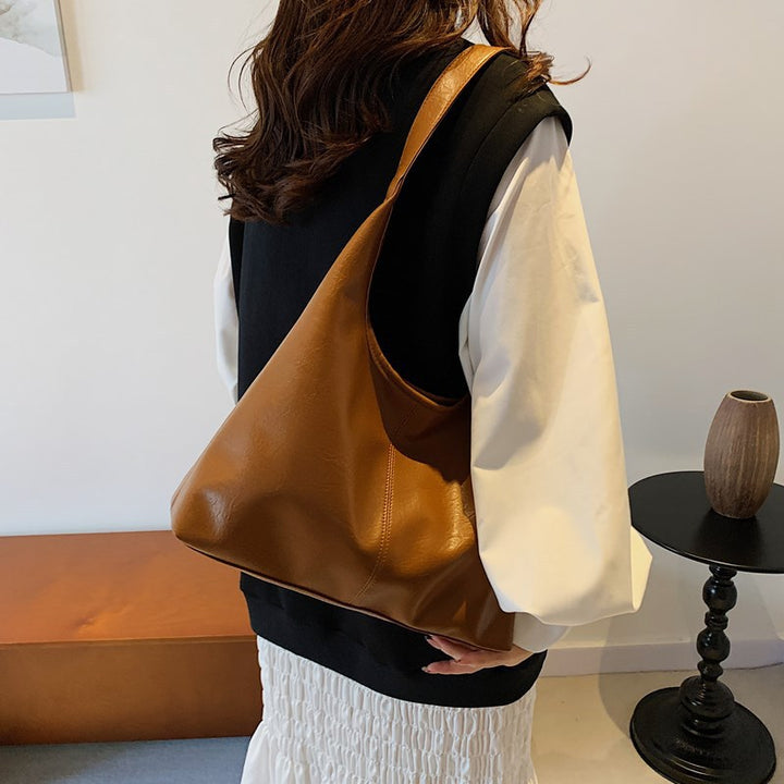 Damen geräumige Ledertasche mit weichem Griff Nord Taschen