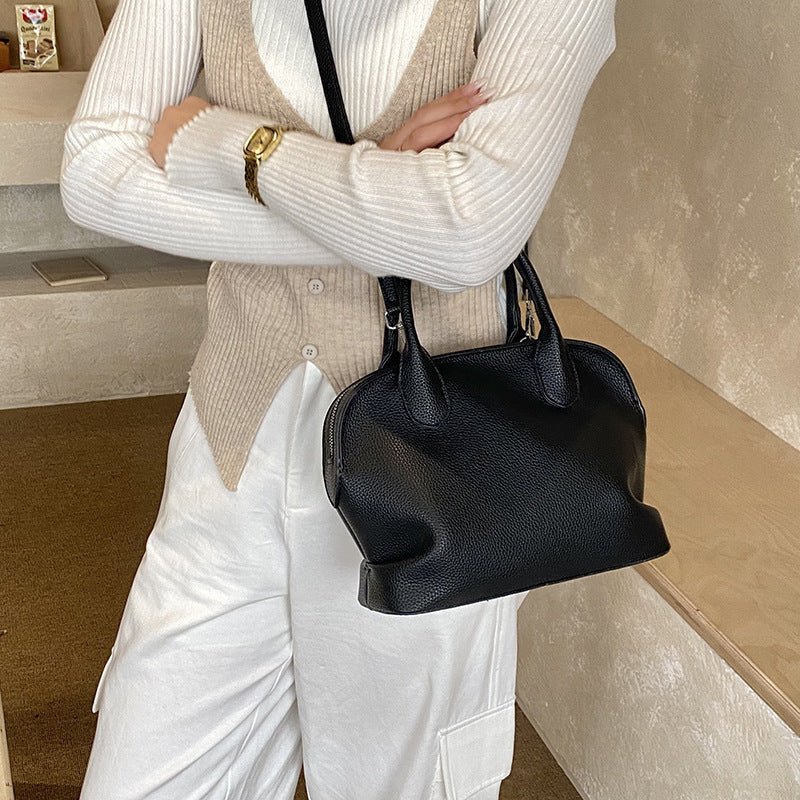 Damenhandtasche aus geschmeidigem Kunstleder, mit verstellbarem Schulterriemen und elegantem Design Nord Taschen