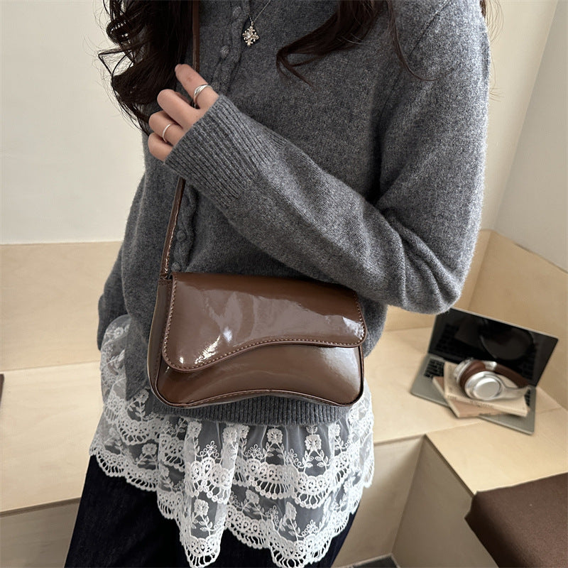 Damen elegante Handtasche mit geschwungenem Design Nord Taschen