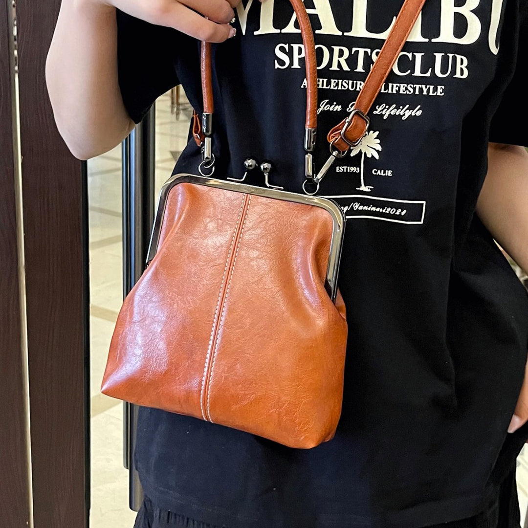 Damen elegante Handtasche mit robustem Metallverschluss Nord Taschen