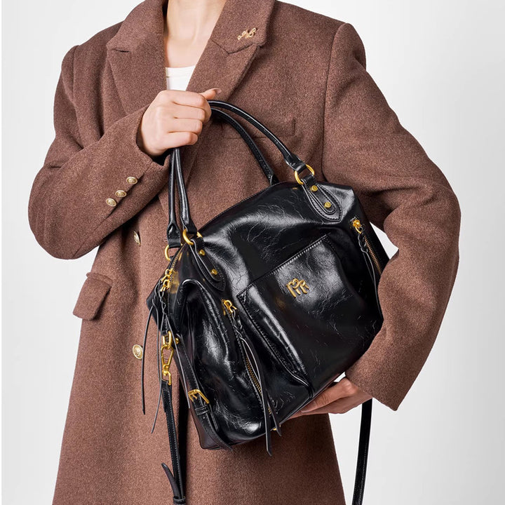 Damen elegante Handtasche mit goldenen Details Nord Taschen