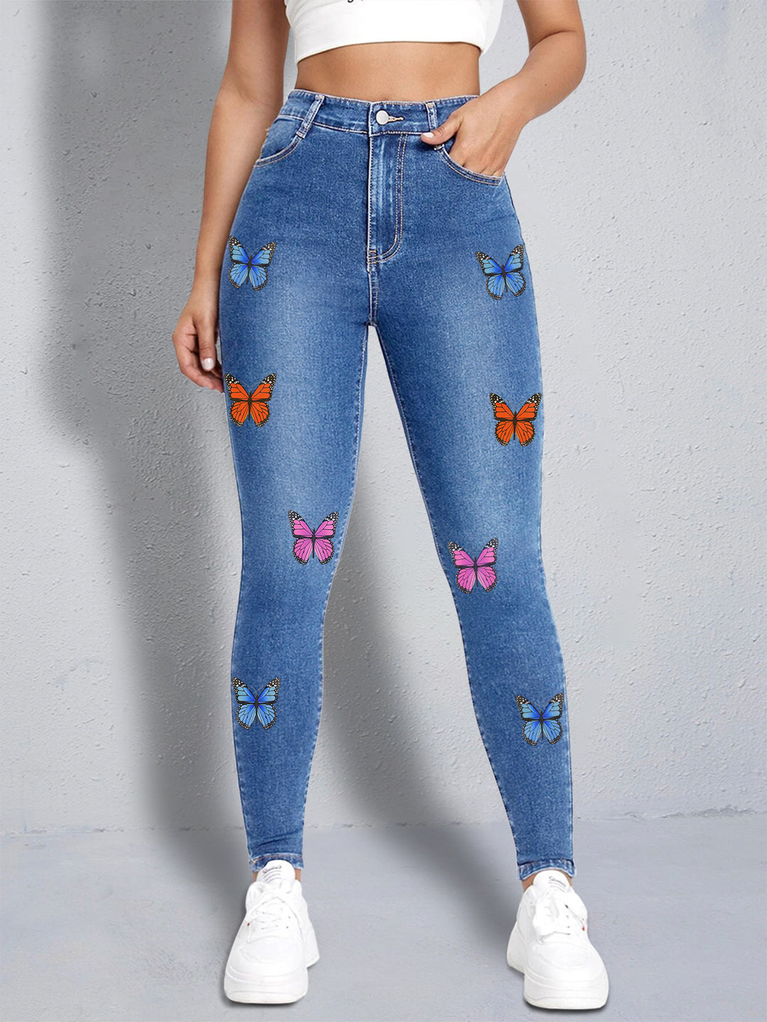 Damen enganliegende High‑Waist Jeansleggings mit buntem Schmetterling-Print Nord Taschen