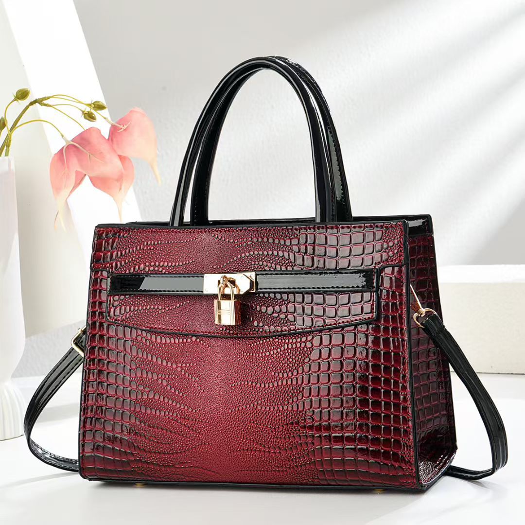 Damen elegante Handtasche mit Schlangenleder-Optik Nord Taschen