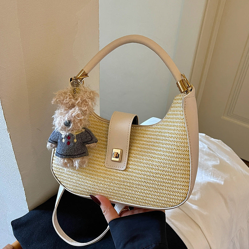 Damen Handtasche mit raffiniertem geflochtenem Design und verspieltem Anhänger Nord Taschen