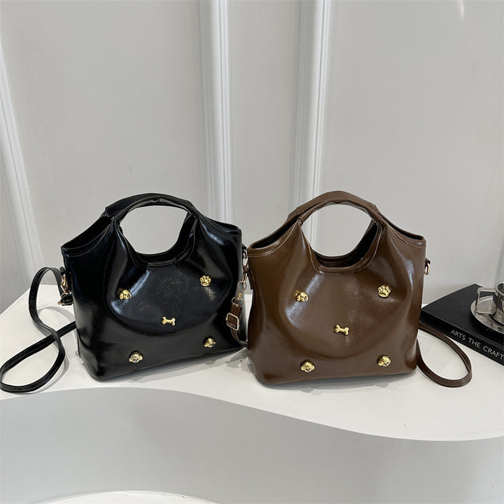 Damen Modische Handtasche mit goldenen Details Nord Taschen