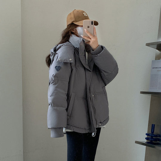 Damen nan oversized gesteppte Winterjacke mit Kapuze und Thermowattierung Nord Taschen