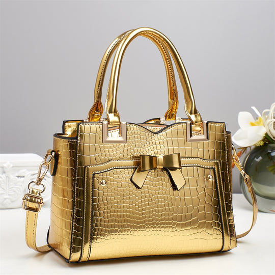 Damen elegante Handtasche mit dekorativem Schleifen-Detail und strukturiertem Krokodil-Leder-Look Nord Taschen
