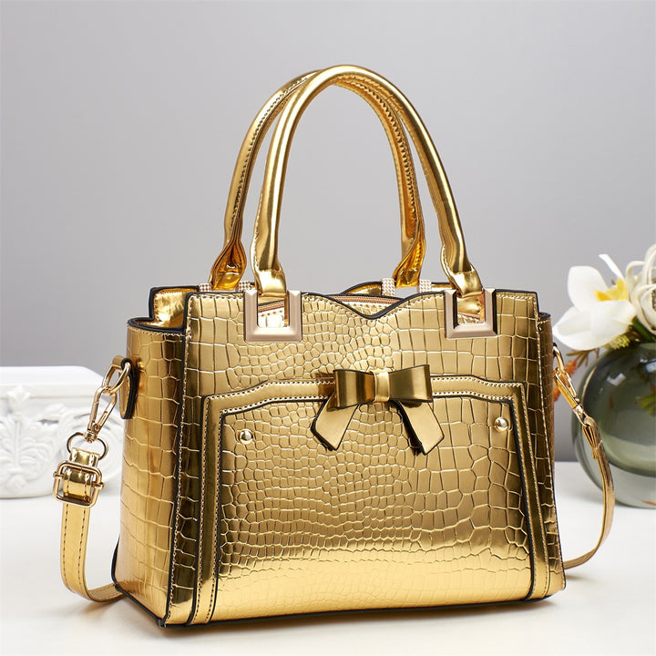 Damen elegante Handtasche mit dekorativem Schleifen-Detail und strukturiertem Krokodil-Leder-Look Nord Taschen