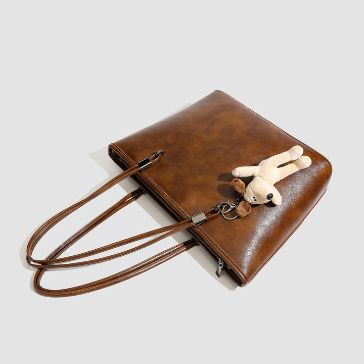 Damen Shopper-Tasche aus hochwertigem Kunstleder mit verspieltem Anhänger Nord Taschen