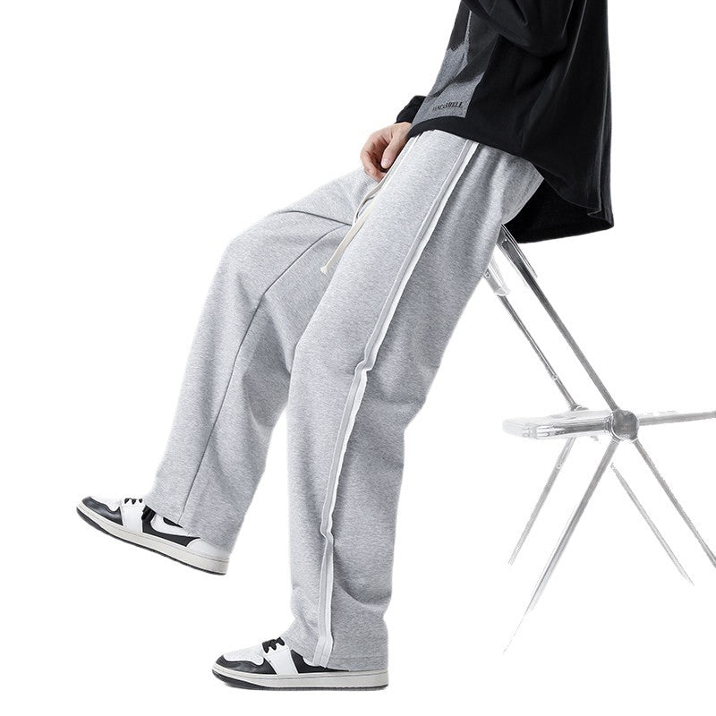 Herren weite Jogginghose im Oversize-Schnitt mit Seitenstreifen, Kordelzug & Fleecefutter Nord Taschen