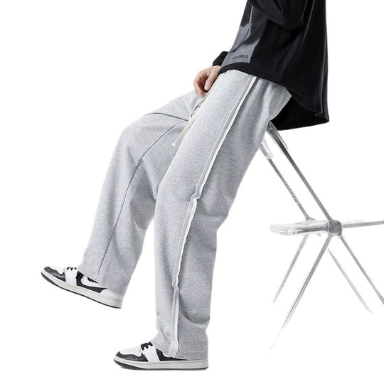 Herren weite Jogginghose im Oversize-Schnitt mit Seitenstreifen, Kordelzug & Fleecefutter Nord Taschen