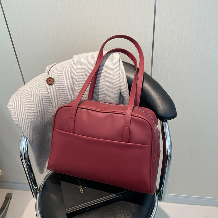 Damen elegante Henkeltasche mit strukturierter Oberfläche und praktischem Innenfach Nord Taschen