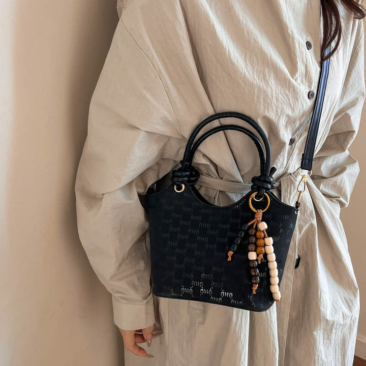 Damen Mini-Handtasche mit schimmerndem Obermaterial und eleganten Accessoires Nord Taschen