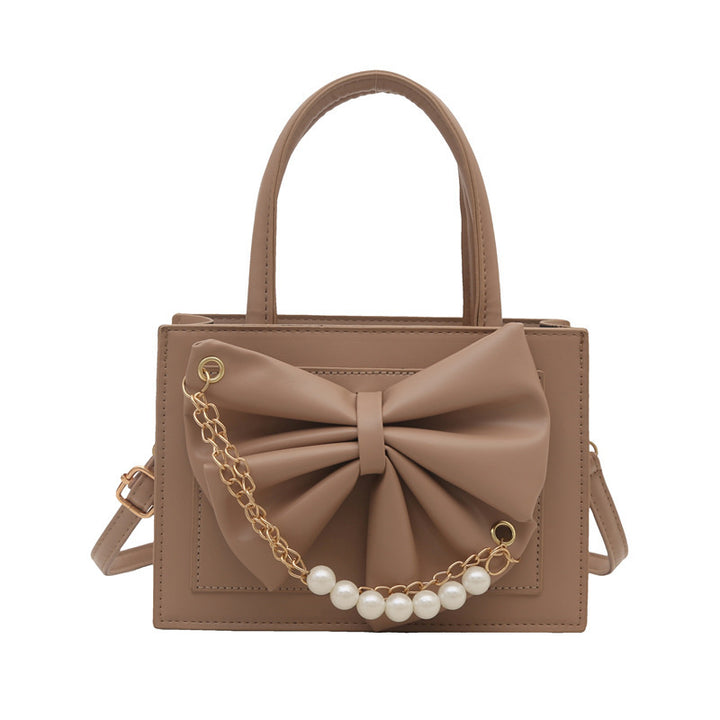 Damen elegante Handtasche mit Schleifenakzent und Perlenverzierung Nord Taschen