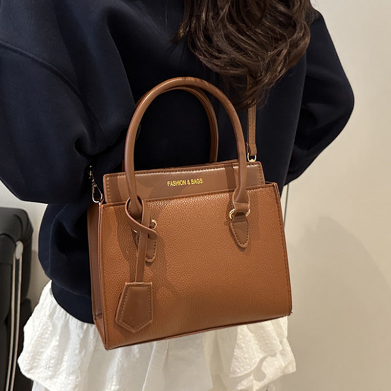 Damen Handtasche mit strukturiertem Kunstleder und eleganten Tragegriffen Nord Taschen