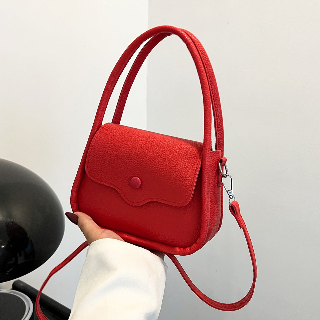 Damen Ledertasche mit dekorativer Klappenöffnung Nord Taschen