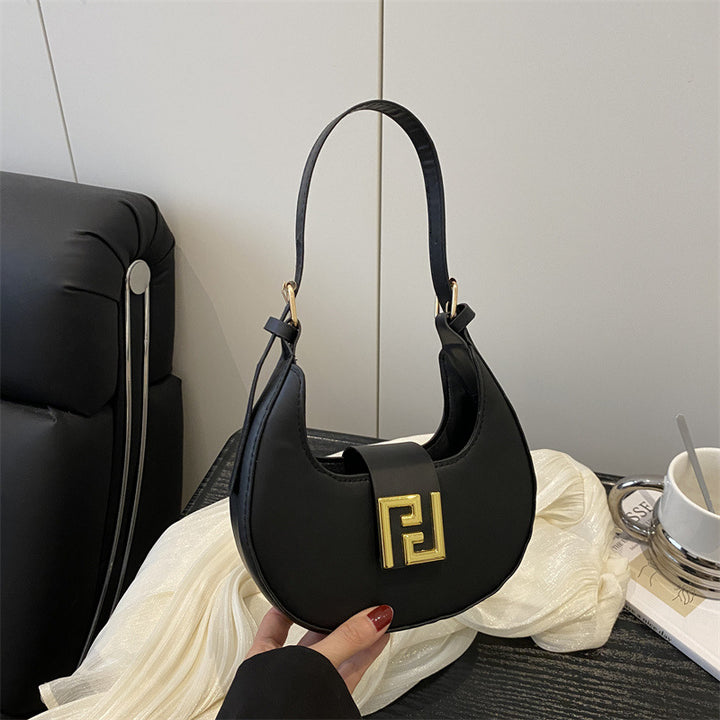 Damen Handtasche mit modernem Design und goldenen Akzenten Nord Taschen