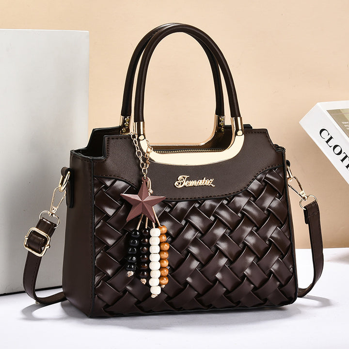 Damen elegante Handtasche mit kunstvollem Flechtmuster und abnehmbarer Quaste Nord Taschen