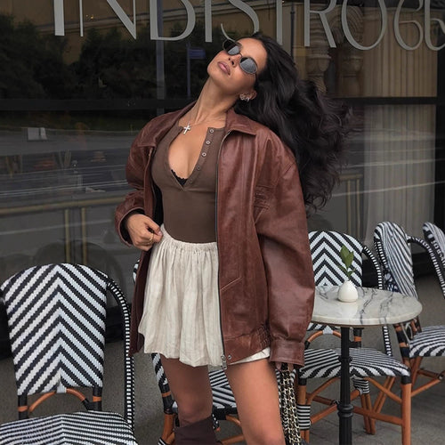 Damen Oversize-Lederimitatjacke im Bikerstil mit Hemdkragen und Reißverschluss Nord Taschen