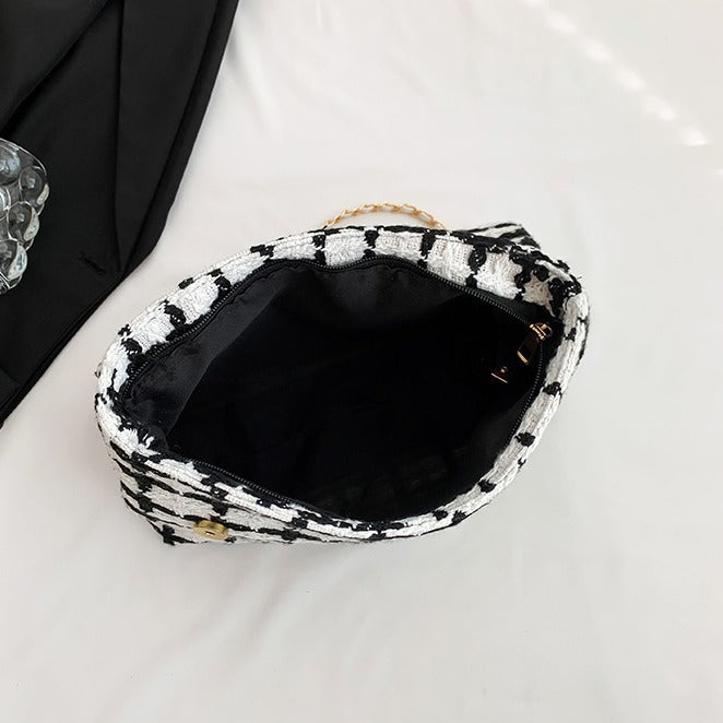 Damen Clutch-Tasche im zeitgenössischen Design mit strukturiertem Muster Nord Taschen