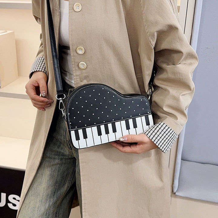 Damen Clutch-Tasche mit verspieltem Klavier-Design Nord Taschen