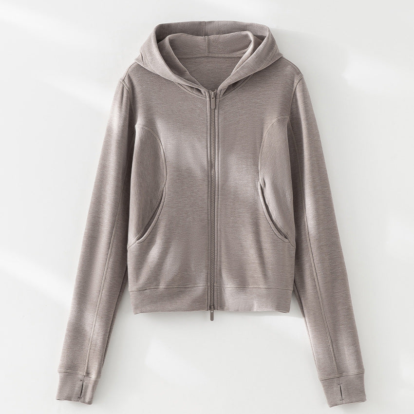 Damen Cropped Kapuzenjacke mit Reißverschluss und konturierten Eingrifftaschen Nord Taschen