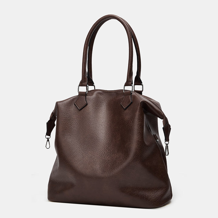 Damen Handtasche mit verstellbarem Schulterriemen und eleganter Lederstruktur Nord Taschen