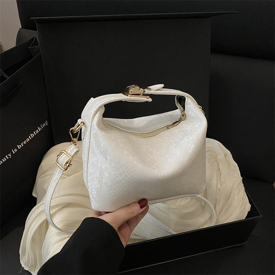 Damen Umhängetasche mit eleganter Schlangenprägung und praktischem Schulterriemen Nord Taschen